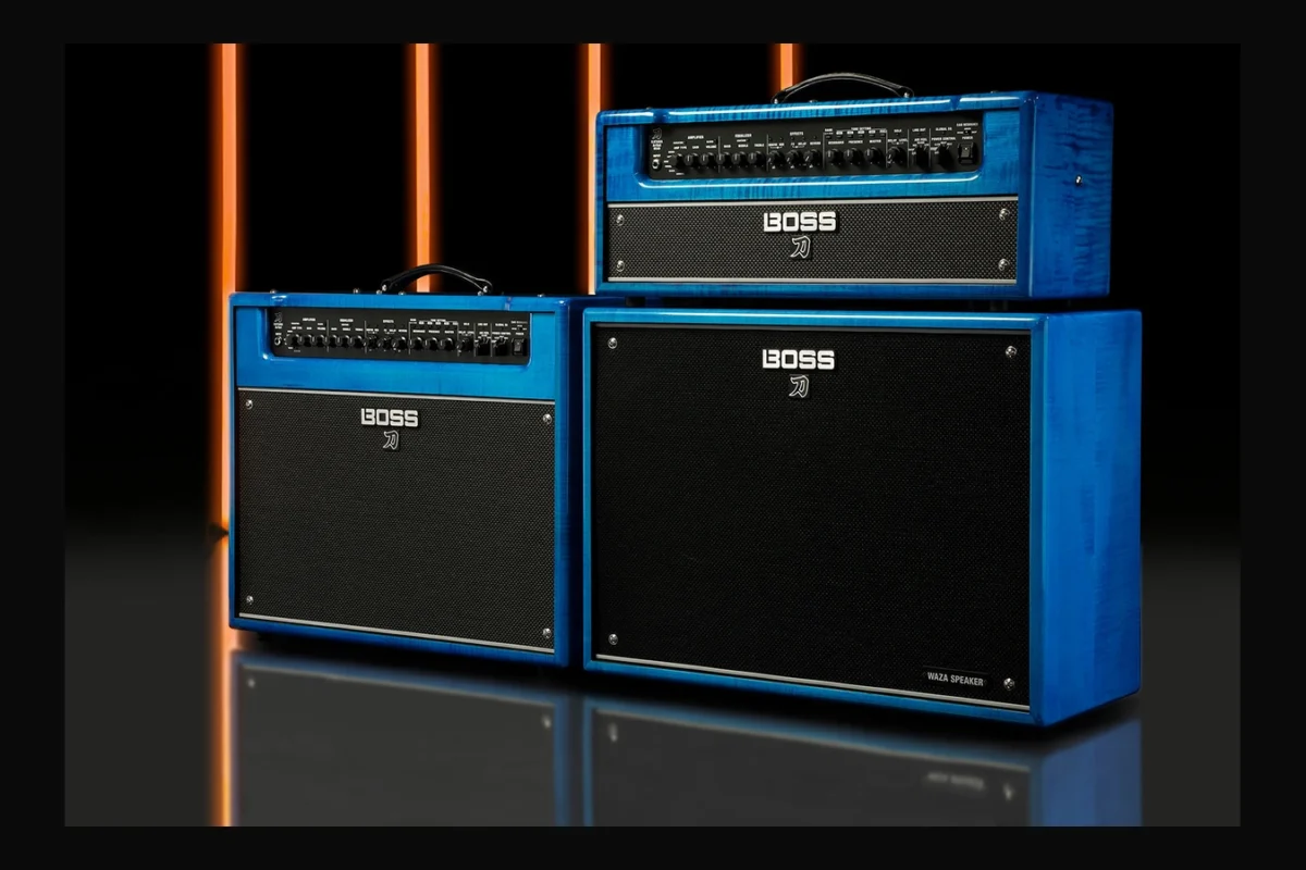 The blue flame-maple Katana Artist Gen 3 combo, Artist Head Gen 3 and Cabinet 212 Waza in BOSS’s official anniversary press photo.