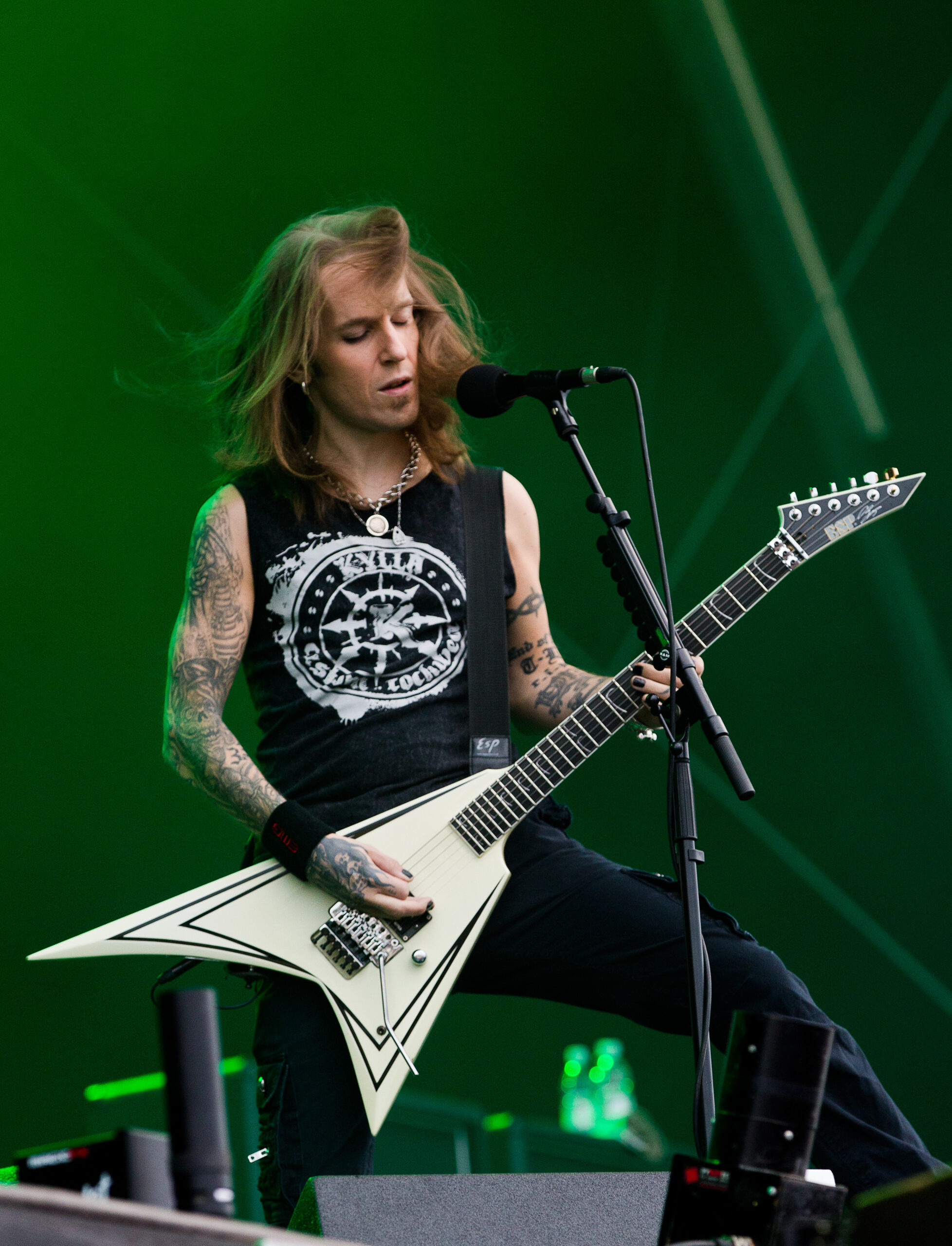Alexi Laiho playing his white ESP custom with black pinstripes at Rockharz, 2016.