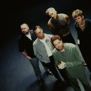 Anberlin’s five members in an official promotional photograph for the Currency album campaign.