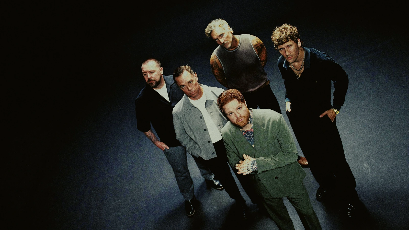 Anberlin’s five members in an official promotional photograph for the Currency album campaign.