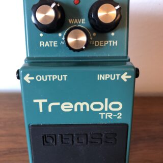 Complete green Boss TR-2 Tremolo pedal with Rate, Wave and Depth knobs and visible model lettering.