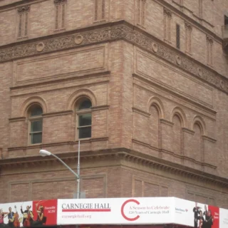 Brick facade and Carnegie Hall sign in New York City, photographed in July 2011
