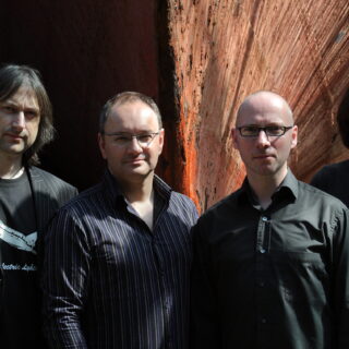Big Big Train group portrait, with Dave Gregory at far right, at SS Great Britain in April 2010.