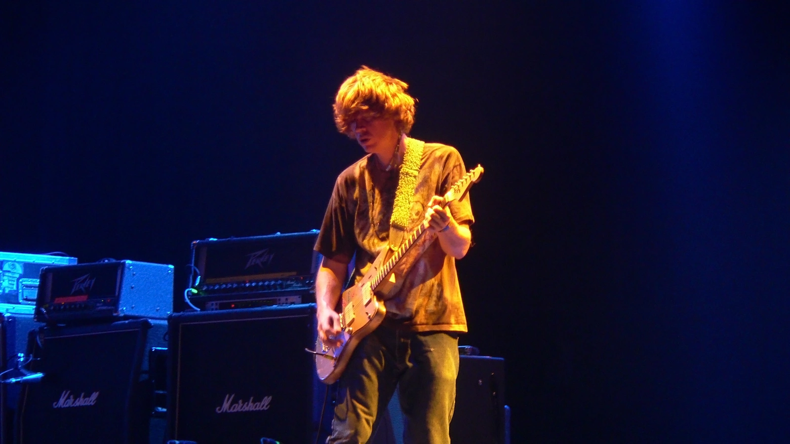 Thurston Moore playing guitar at Roskilde Festival in 2005, shown as later-era context for the Daydream Nation anniversary