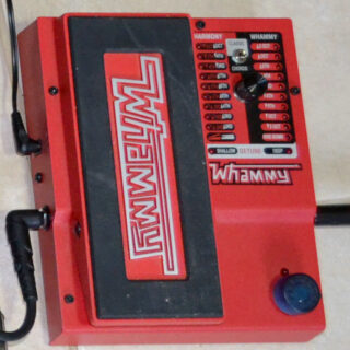 Complete red DigiTech Whammy V pedal with expression treadle, pitch selector and Classic/Chords switch.