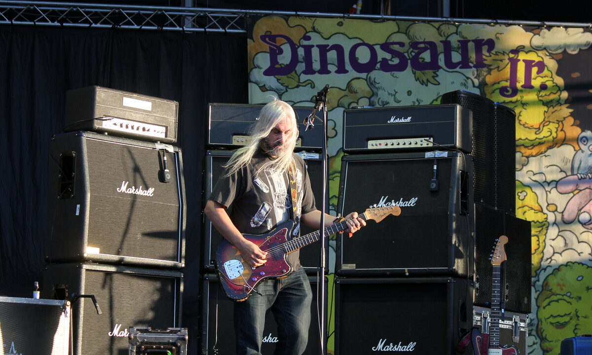 J Mascis playing an electric guitar onstage at Optimus Primavera Sound in 2013.