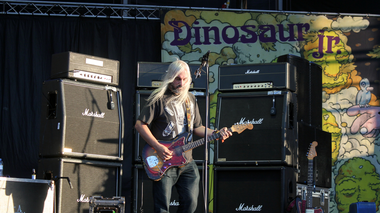 J Mascis playing an electric guitar onstage at Optimus Primavera Sound in 2013.