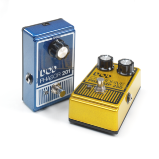 The complete gold 2013 DOD 250 Overdrive Preamp beside a blue DOD 201 Phasor on a white background.
