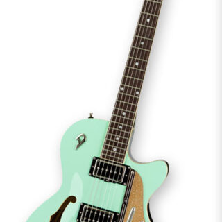 Complete surf-green Duesenberg Starplayer TV with its headstock, six tuners, f-hole, bridge and vibrato tailpiece visible against white.