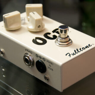 Complete cream-coloured Fulltone OCD v.1 pedal with three knobs and a metal footswitch.