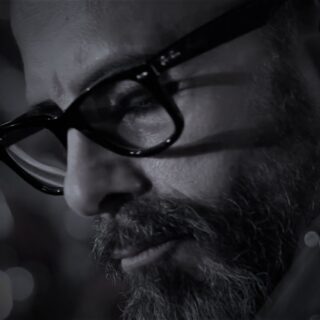 Dan Spitz in black-and-white profile.