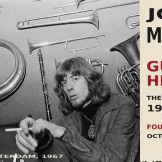 John Mayall seated in an Amsterdam instrument shop in November 1967.