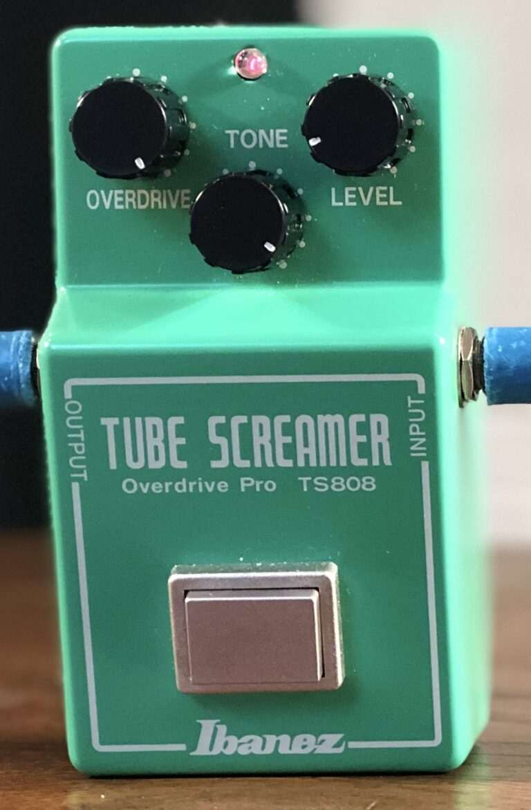 Complete green Ibanez TS808 Tube Screamer Overdrive Pro pedal with three knobs, square footswitch and blue-wrapped cables.
