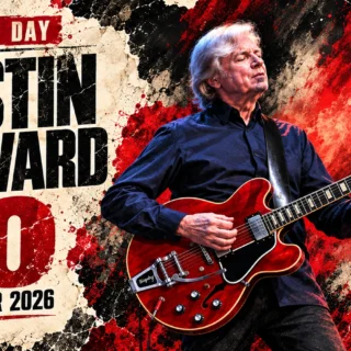 Justin Hayward depicted with a red semi-hollow guitar beside his 80th birthday date, October 14, 2026.