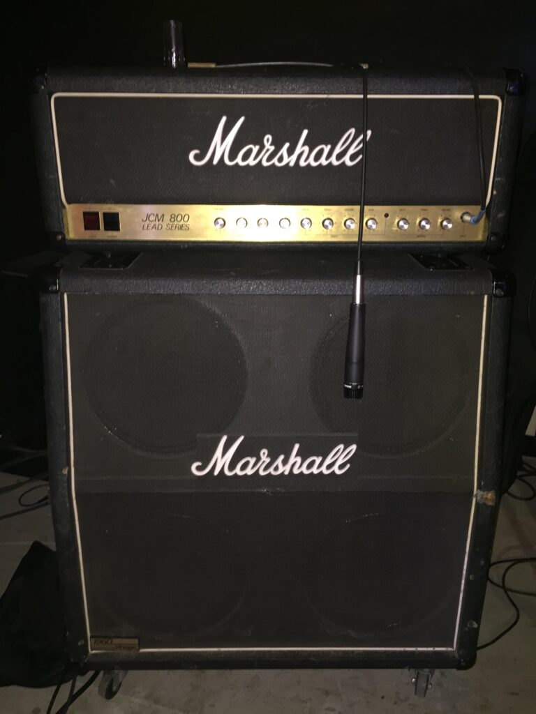 Marshall JCM800 Lead Series split-channel head on a Marshall speaker cabinet.
