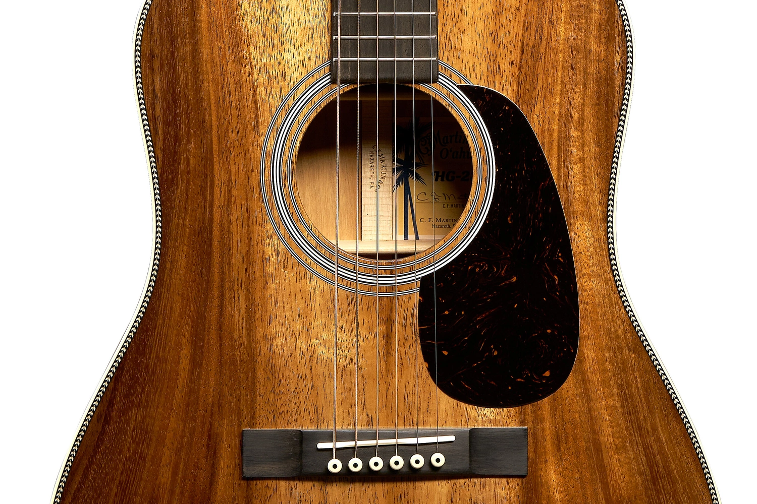 HG-28K2 koa top, soundhole, pickguard and ebony bridge.