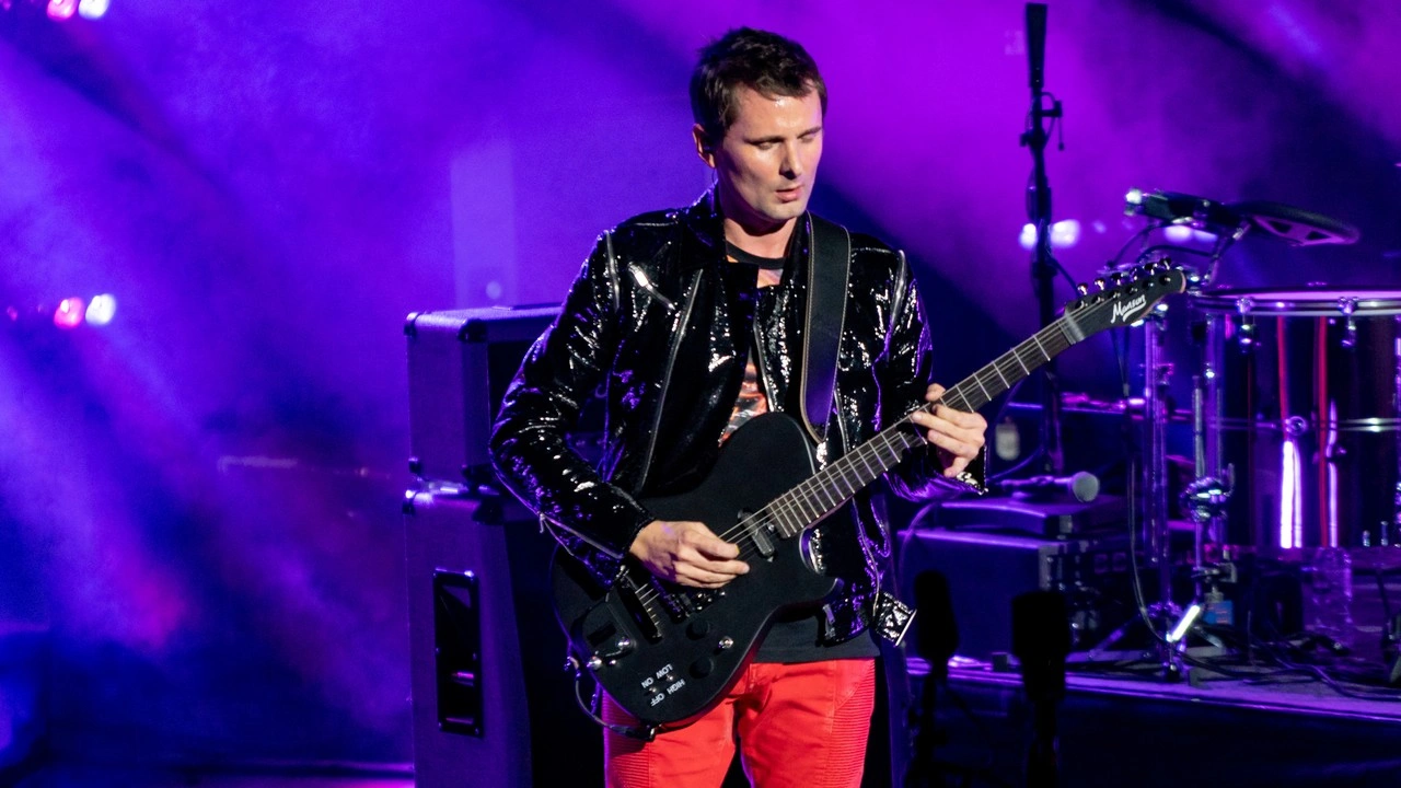 Matt Bellamy playing a black Manson guitar at the Royal Albert Hall in 2018.