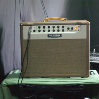 Mesa/Boogie Lone Star Special combo amplifier in a rehearsal room, with the full cabinet, control panel and carry handle visible.