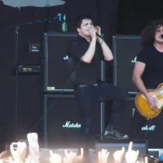 Gerard Way singing beside Ray Toro playing a sunburst electric guitar at Big Day Out in Perth in 2007.