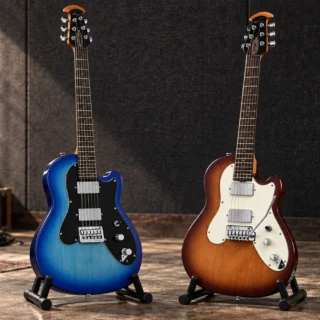 Editorial illustration of two Ovation Viper electric guitars: Blue Burst with a hardtail bridge and Honey Burst with a tremolo bridge.