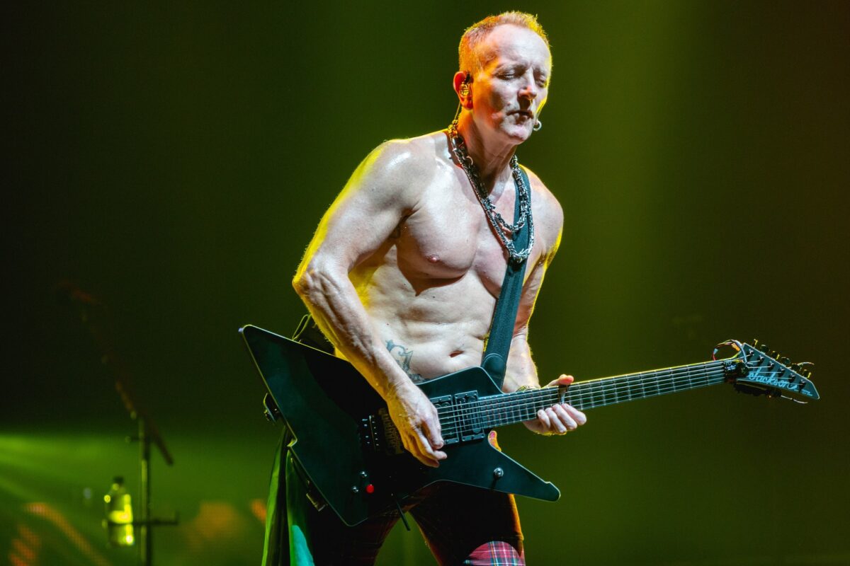 Phil Collen of Def Leppard on stage at The O2 in London in 2018.