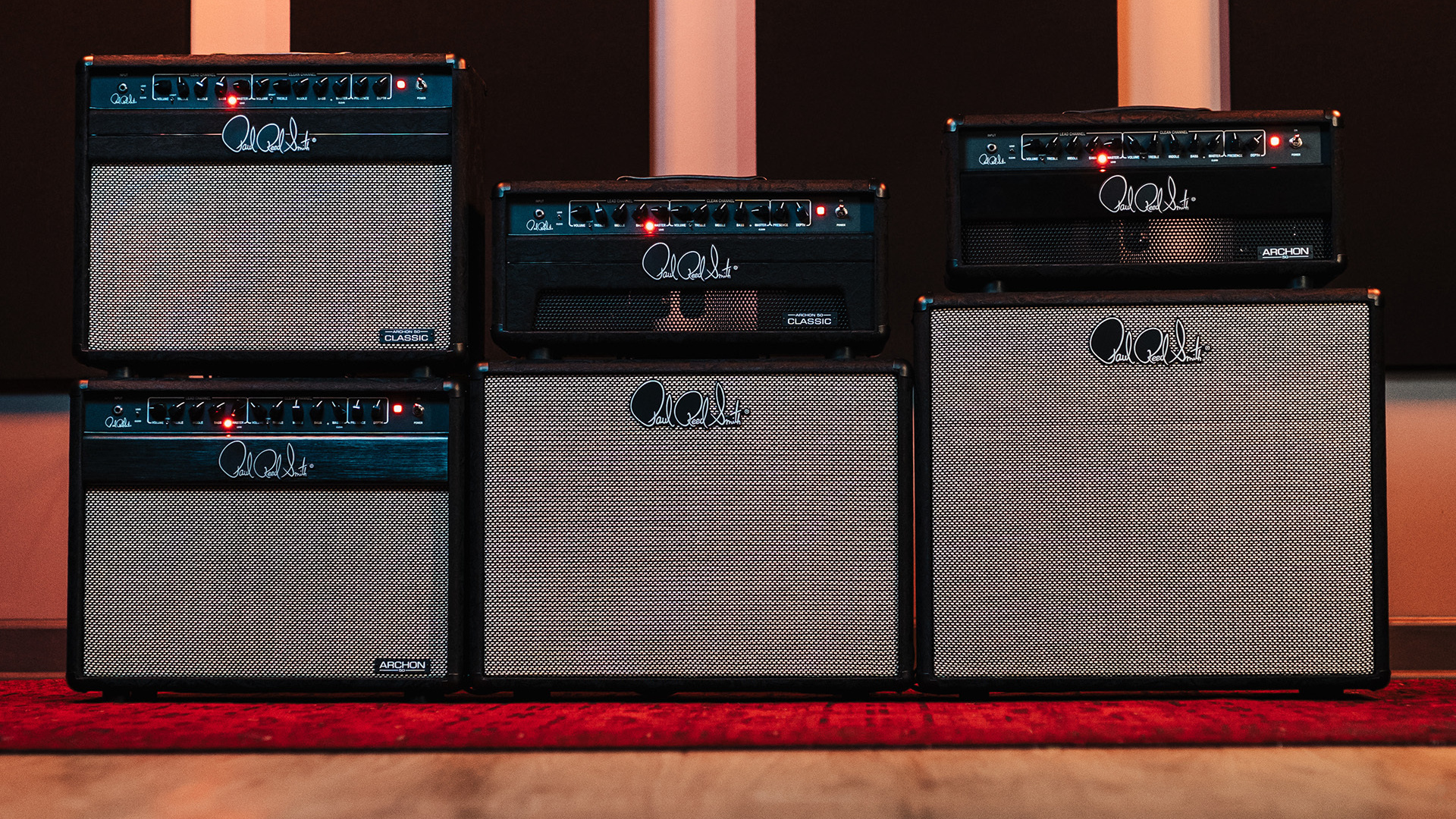 All six PRS Archon Black Paisley products: two combo amplifiers, two heads and two speaker cabinets.