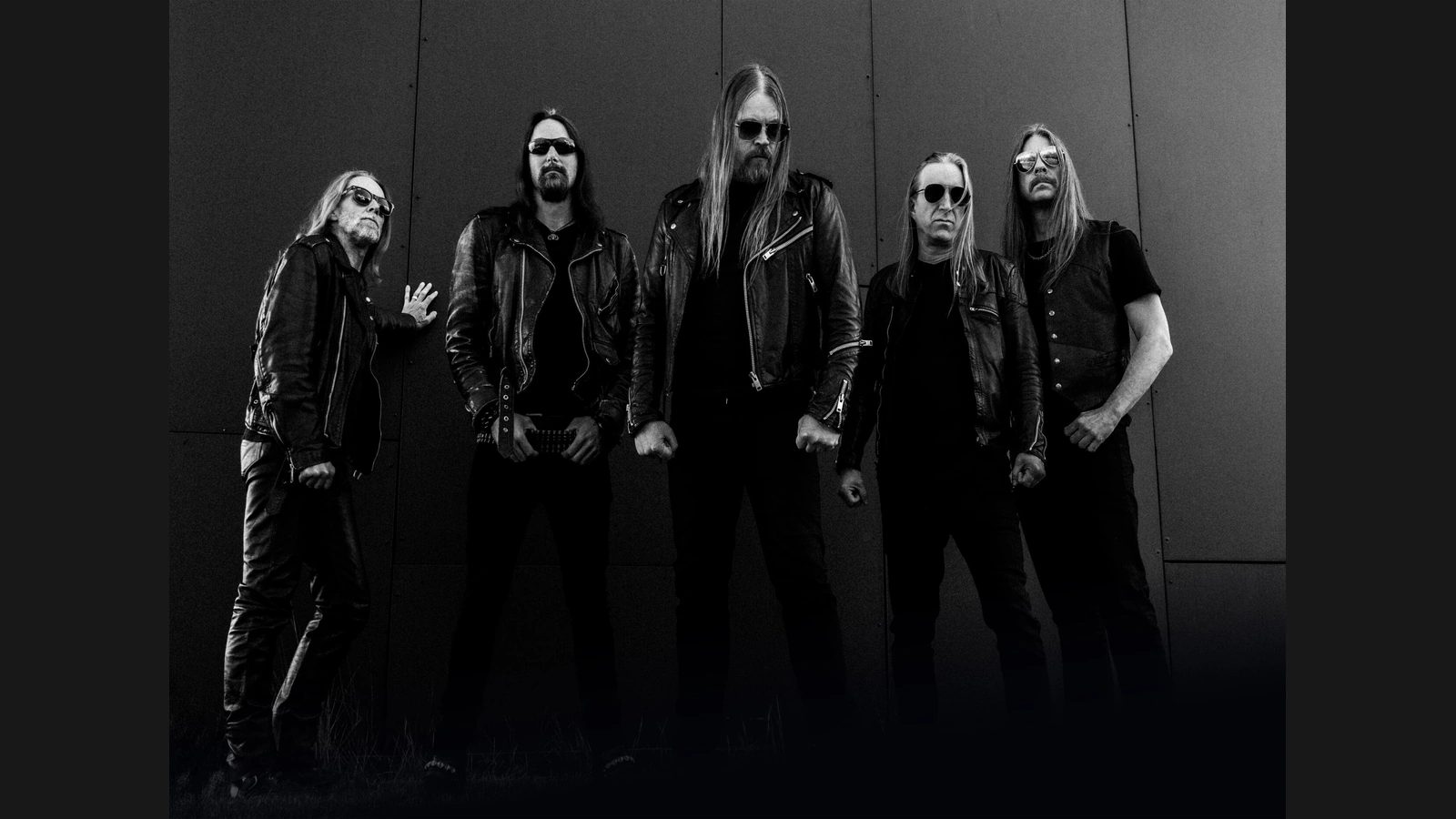 Five members of RAM in a black-and-white promotional photograph for Against.
