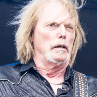 Scott Gorham in a head-and-upper-torso concert portrait at Nova Rock in 2017.