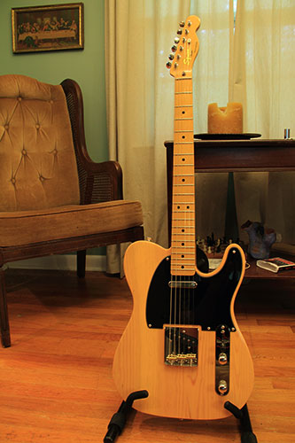 The complete butterscotch Squier Classic Vibe ’50s Telecaster photographed in 2011, standing indoors with a black pickguard and maple neck.