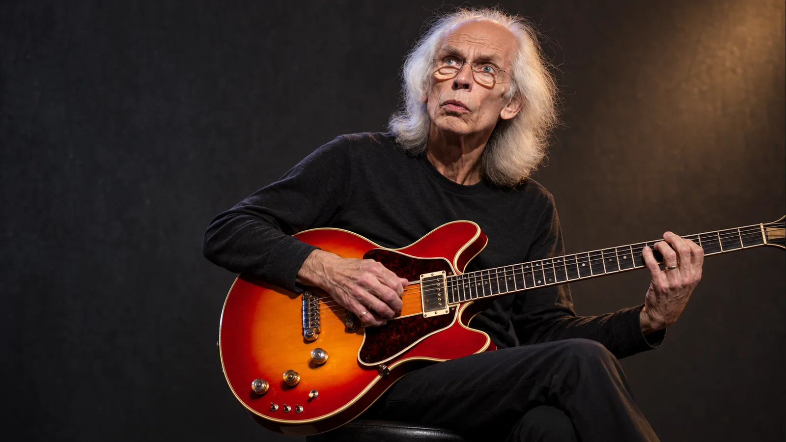 Editorial illustration of Steve Howe playing a sunburst Gibson ES Artist